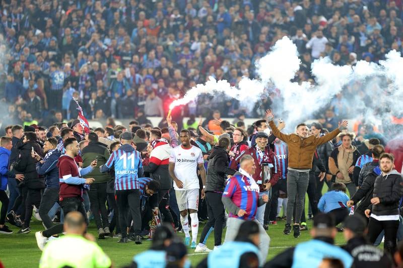 It was all too much for some Trabzonspor fans, who ran on to the pitch before the end of match. EPA