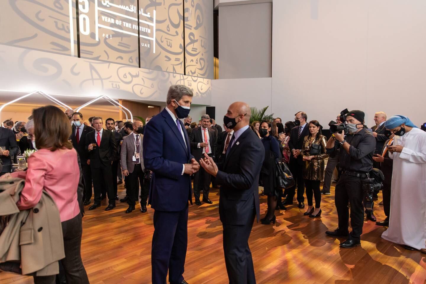 John Kerry, the US climate envoy, and Yousef Al Otaiba, the UAE ambassador to the US, speak at the Washington celebration. Photo: UAE embassy