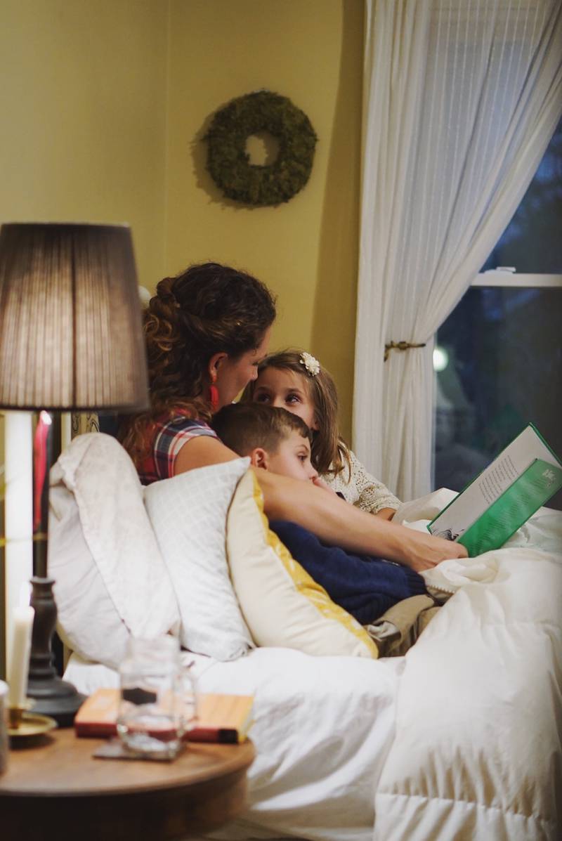 Parents who work long hours may choose co-sleeping as a way to make up for the time they don't get to spend with their children. Photo: Mark Zamora /Unsplash