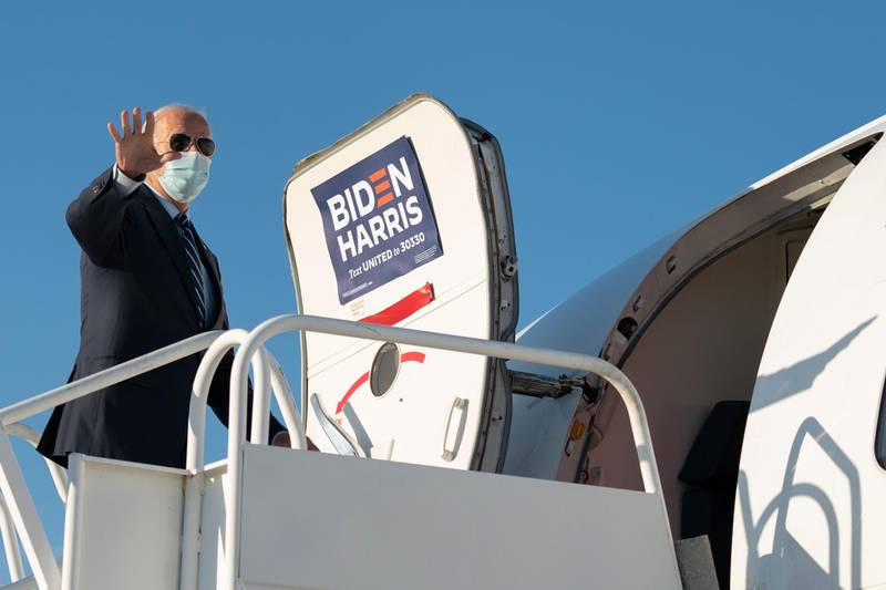 Democratic presidential candidate Joe Biden boards his campaign plane at Raleigh-Durham International Airport in Morrisville, North Carolina. AP Photo