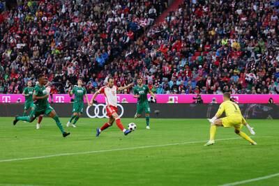 Harry Kane of Bayern Munich scores the team's third goal. Getty