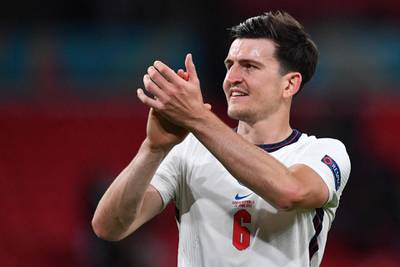 England defender Harry Maguire applauds the crowd after returning to action. AFP