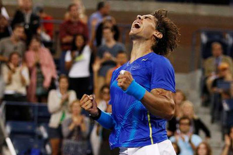 Rafael Nadal of Spain reacts after winning a semifinal match against Andy Murray of Britain at the U.S. Open tennis tournament in New York, Saturday, Sept. 10, 2011. (AP Photo/Charles Krupa) 