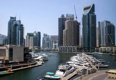 Investments from high-net-worth individuals, strong economic growth as well as population growth have helped the property sector to record growth in Dubai. Victor Besa / The National