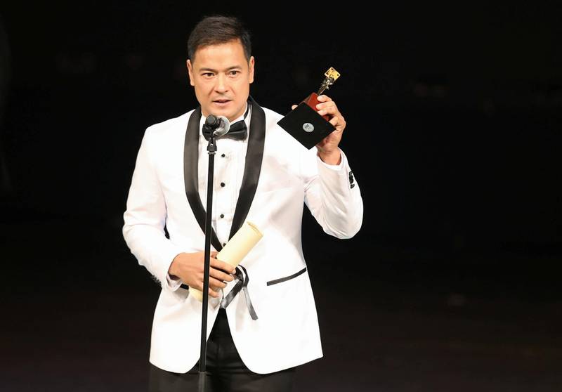 Filipino director Brillante Mendoza receives the Best Artistic Contribution award during the closing ceremony of the 41st Cairo International Film Festival. Reuters