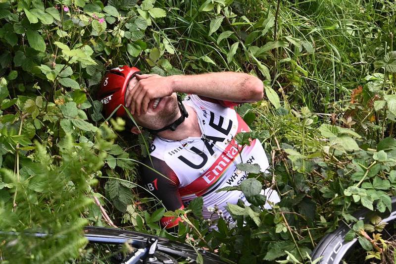 Marc Hirschi receives medical treatment after crashing during the first stage of the Tour de France.