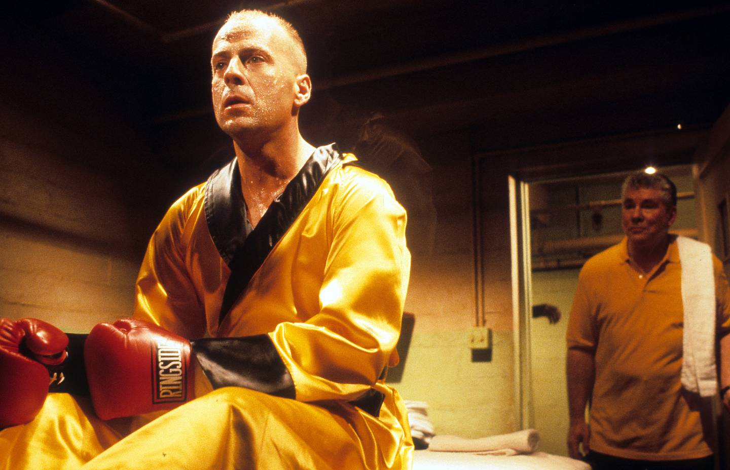 In Pulp Fiction, Bruce Willis plays Butch Coolidge, an aging boxer on the run from the gangster Marsellus (Ving Rhames) after having double-crossed him. Photo: Miramax Films