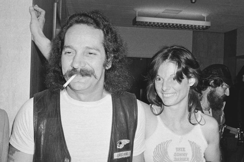 FILE - Hells Angels founder Ralph "Sonny" Barger and his wife Sharon are shown after his release on $100,000 bond in San Francisco, Aug.  1, 1980.  Barger, the leather-clad figurehead of the notorious Hells Angels motorcycle club, has died at age 83.  Barger's death was announced late Wednesday, June 29, 2022, on his Facebook page.  Barger composed the post placed on the Facebook page managed by his current wife, Zorana.  (AP Photo / Robert Houston, File)