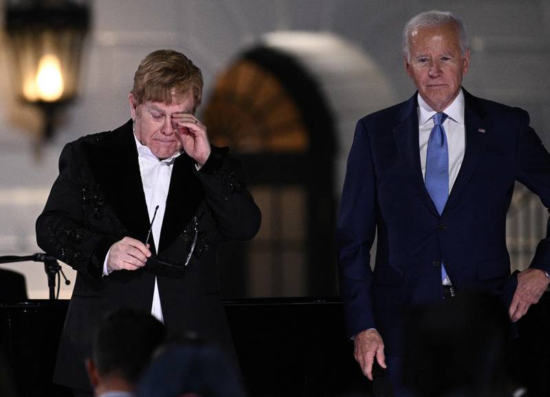 Sir Elton was overcome with emotion at the unexpected announcement. AFP