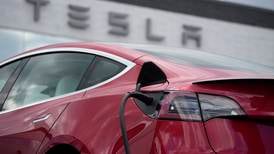 Tesla recalls nearly 1 million vehicles over window glitch