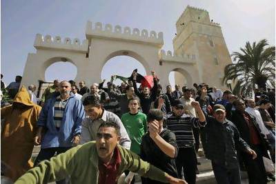 Protesters pour out of Muradagha mosque in Tripoli to demonstrateagainst Muammar Qaddafi after Friday prayers in the Tajoura district of the Libyan capital.