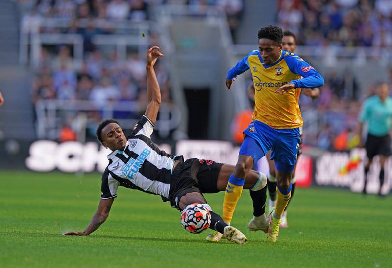 Kyle Walker-Peters - 7: Surging runs cutting inside from left on recall to side and caused Newcastle all sorts of problems in first half. Booked. PA