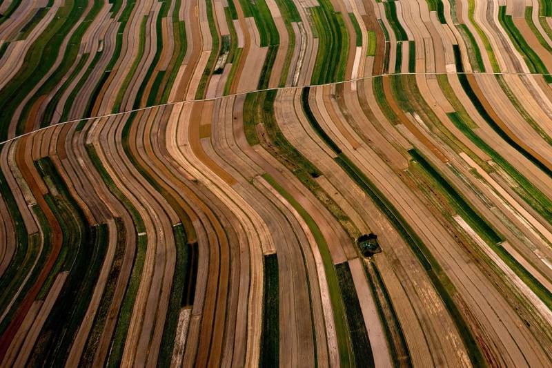 An aerial picture taken by a drone shows farmland outside Suloszowa village in southern Poland. EPA