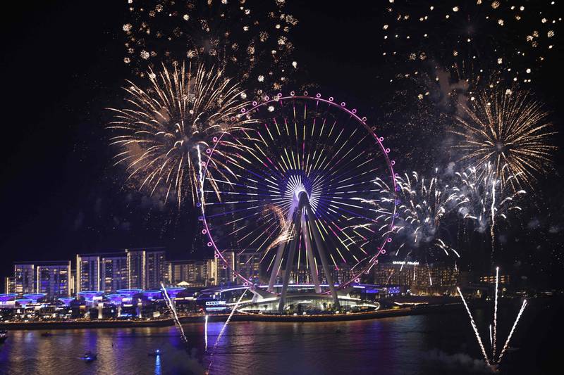 Fireworks light the sky above Ain Dubai (the Dubai Eye), the world’s largest and tallest observation wheel, to celebrate Diwali, the Hindu Festival of Lights, on November 4, 2021.   AFP