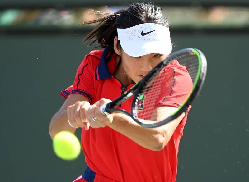 Raducanu hits a ball on the practice courts. USA Today