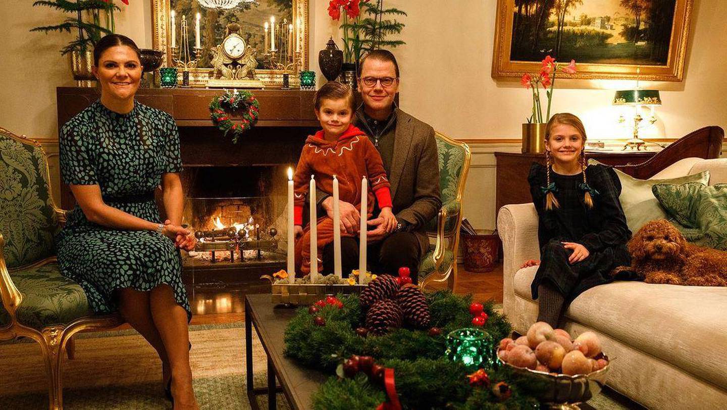Crown Princess Victoria and Prince Daniel of Sweden, along with their children, Estelle and Oscar, chose this image of the family lighting the first candle of the traditional Advent wreath for their Christmas card. Instagram