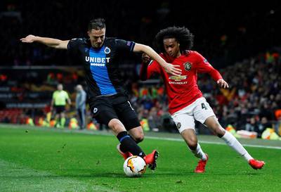 Club Brugge's Matej Mitrovic takes on Manchester United's Tahith Chong. Reuters