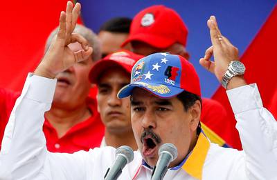 Venezuela's President Nicolas Maduro speaks during an anti-imperialist rally for peace, in Caracas, Venezuela, Saturday, March 23, 2019. The U.S. withdrew all embassy personnel from Caracas due to safety concerns after Maduro severed ties with the U.S. over its support for opposition leader Juan Guaido. (AP Photo/Natacha Pisarenko)
