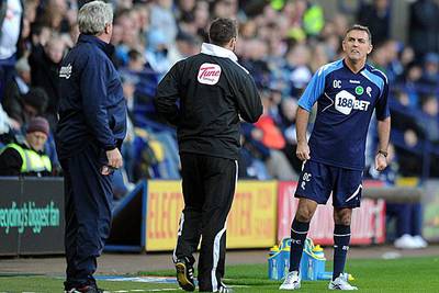 Owen Coyle, the Bolton manager, right, directs his difference in opinion to his opposite number Steve Bruce, the Sunderland manager.

Chris Brunskill / Getty Images