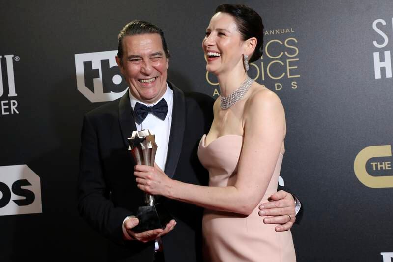 Ciaran Hinds, left, and Caitriona Balfe, winners of the award for Best Ensemble for 'Belfast'. AP