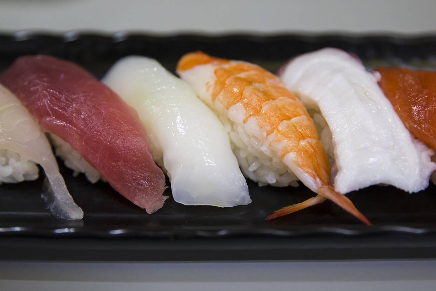 A plate of sushi is served at a sushi restaurant at Tsukiji Outer Market in Tokyo, Japan, on Thursday, Sept. 27, 2018.  After more than 80 years, on Oct. 6, Tokyo's iconic��Tsukiji��fish��market will close and relocate to a new site at Toyosu Market, scheduled to open on Oct. 11. Most businesses are set to make the move but many shops and restaurants surrounding Tsukiji Market will remain at their current location. Photographer: Tomohiro Ohsumi/Bloomberg