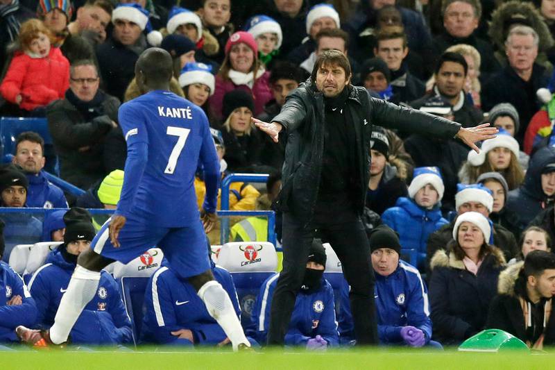 Chelsea manager Antonio Conte, right, gives instructions during the English Premier League soccer match between Chelsea and Southampton at Stamford Bridge in London, Saturday Dec. 16, 2017. (AP Photo/Tim Ireland)