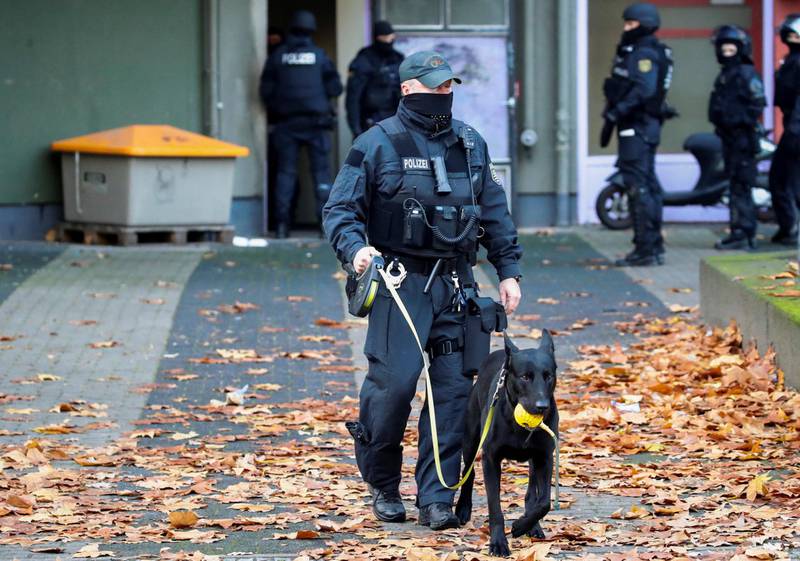 German police officers secure the area during raids in Berlin. Reuters