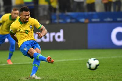 Brazil's Gabriel Jesus takes a penalty against Peru's goalkeeper Pedro Gallese. AFP