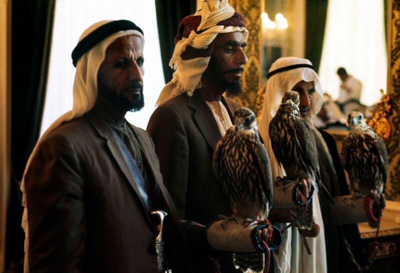 Sheikh Zayed's falconers attend a celebration at Sheikh Zayed's palace in Abu Dhabi in 1971. Bruno Barbey / Magnum Photos / arabianEye.com