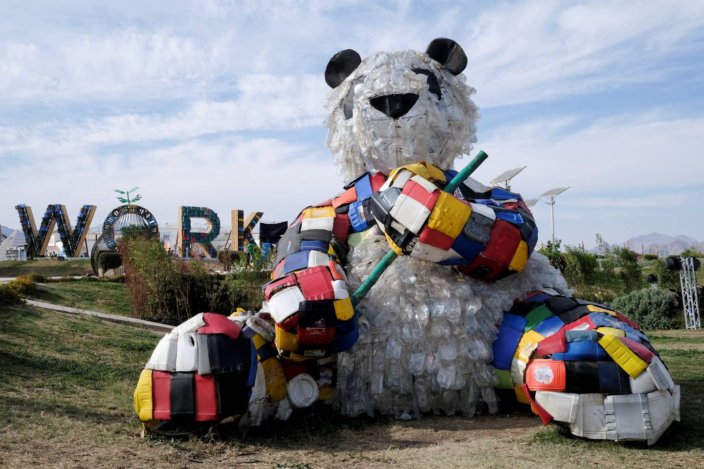 A plastic waste panda is displayed at the "Green Zone" during the UN climate summit in Egypt. Reuters