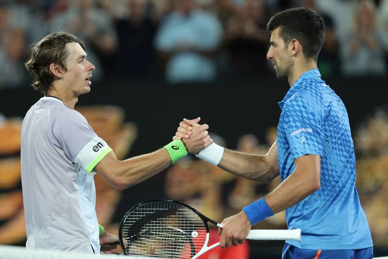 Alex de Minaur of Australia congratulates Novak Djokovic after their Australian Open match. Getty
