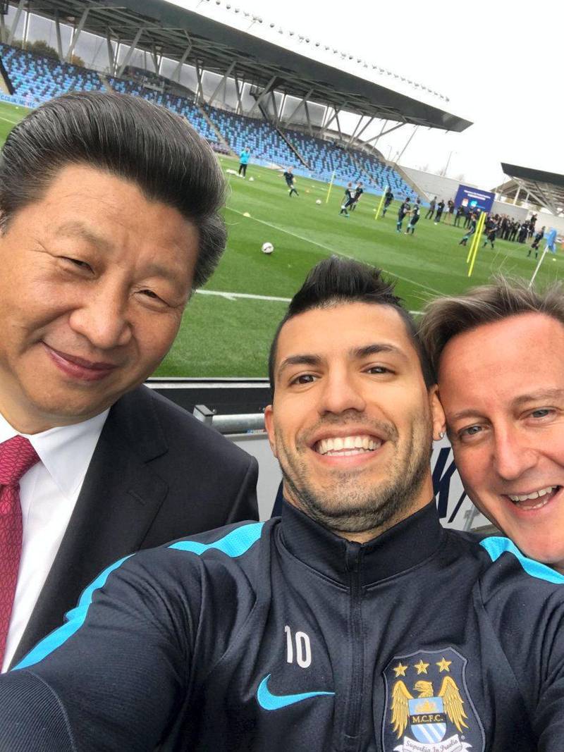 Manchester City striker Sergio Aguero takes a selfie with Chinese President Xi Jinping and former British Prime Minister David Cameron during a visit to the club's academy in 2015. That same year Manchester City's parent City Football Group announced an investment in it by China Media Capital to take a 13 per cent shareholding. 