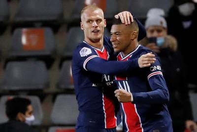 Kylian Mbappe celebrates scoring their third goal with Mitchel Bakker. Reuters