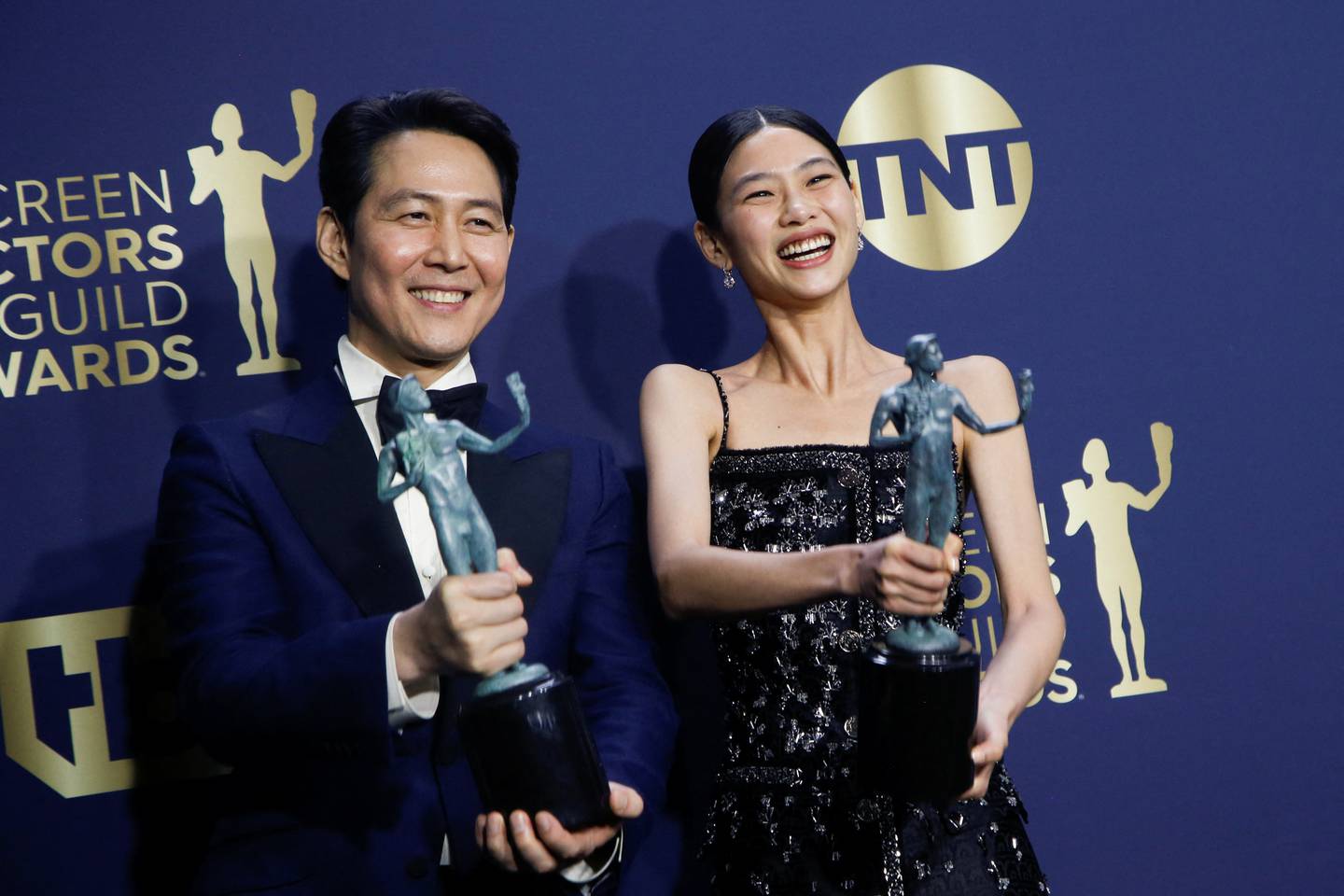 Actors Lee Jung-jae and Jung Ho-yeon backstage with their awards for Outstanding Performance by a Male Actor and Female Actor in a Drama Series at the 28th Screen Actors Guild Awards. Reuters