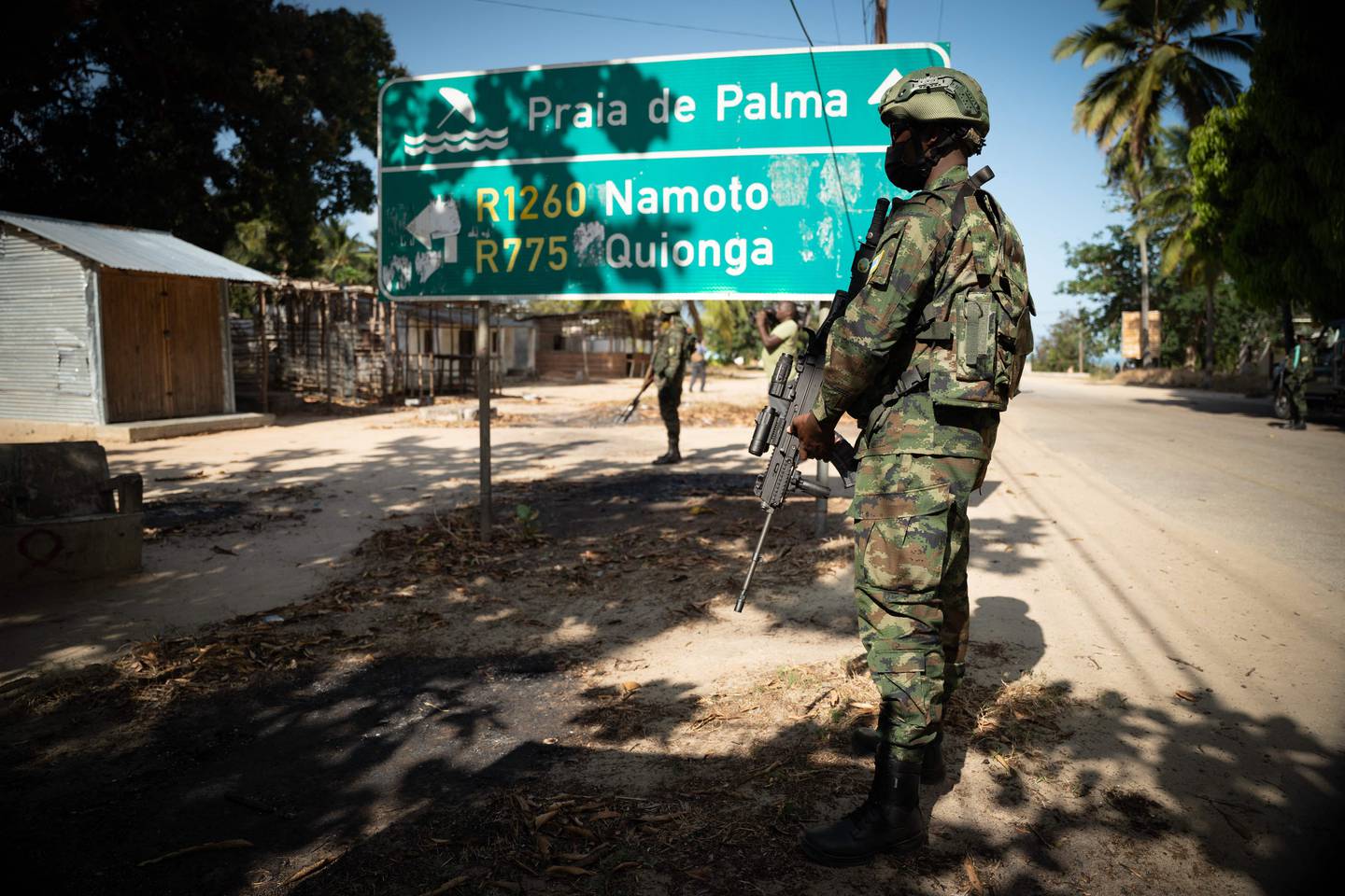 A Rwandan soldier stands guard near Palma, Cabo Delgado in Mozambique, part of a contingent of 1,000 troops and police officers sent to fight ISIS insurgents who were terrorising local towns. AFP