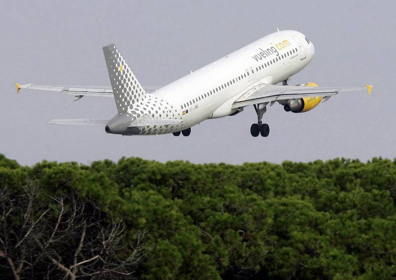 A Vueling aircraft takes off at Barcelona airport. The airline is based in Barcelona. Josep lago / AFP