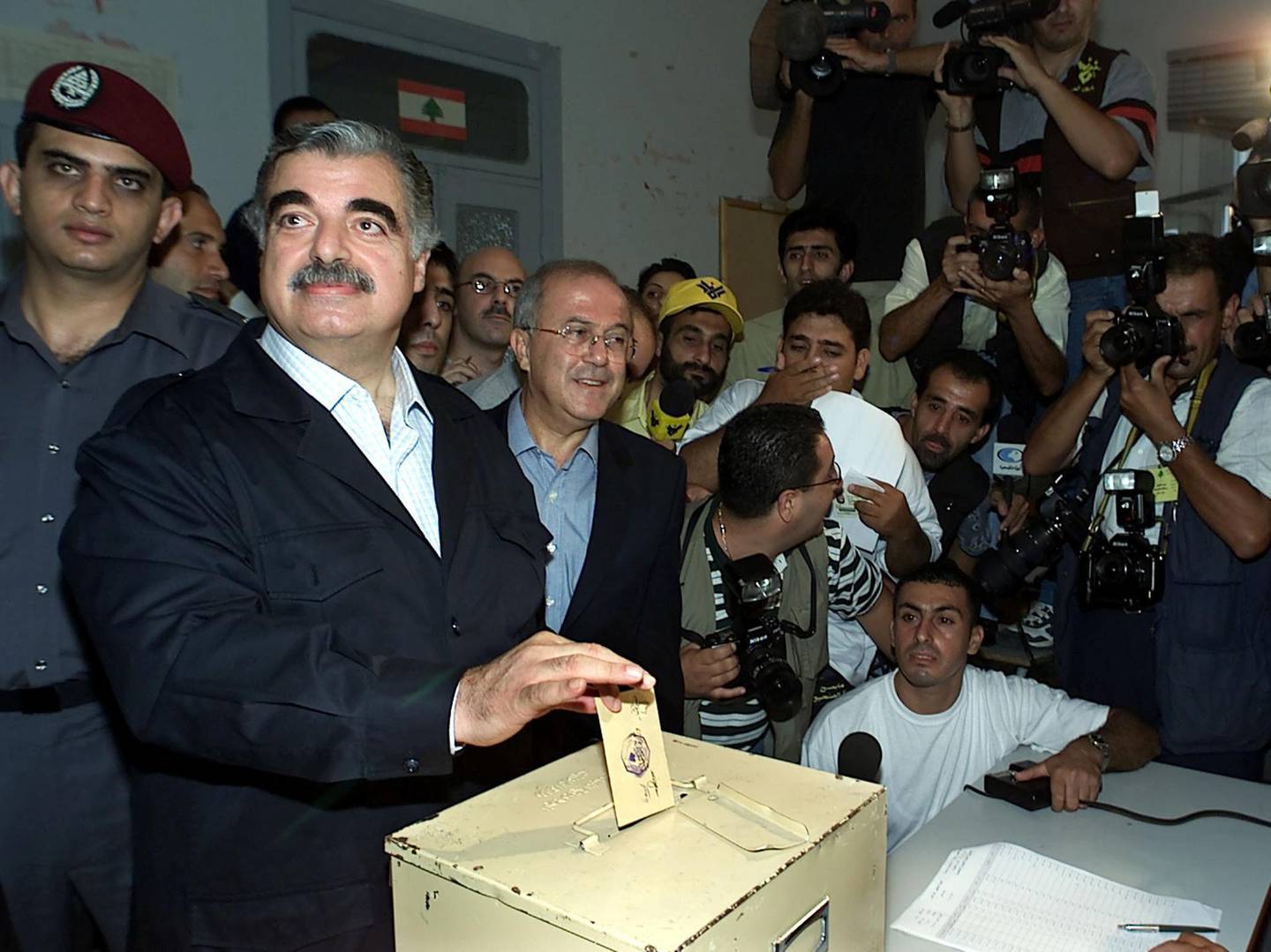 FILE PHOTO: Former Lebanese prime minister Rafik al-Hariri, casts his vote at a polling station in Beirut, Lebanon September 3, 2000. REUTERS/Jamal Saidi/File Photo
