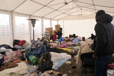 Refugees from Ukraine in a tent at the Medyka border crossing, Poland. AP