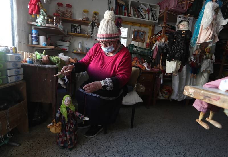 Tunisian Dalila Labidi, 73, makes puppets in her workshop in Ben Arous, Tunis. All photos EPA