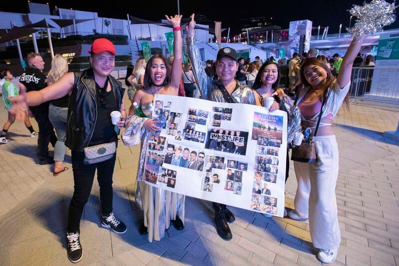 Another group of fans made a sign for the boy band.