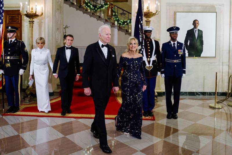 The Bidens lead the Macrons into the state dinner. AFP