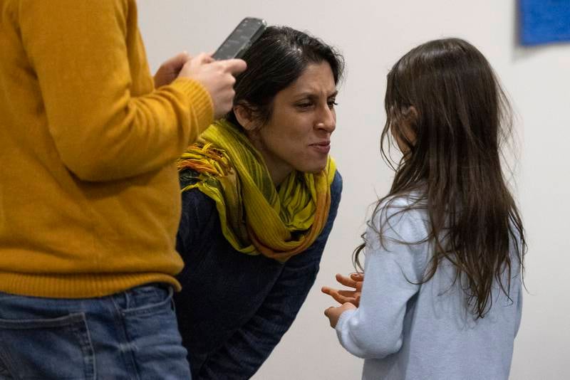 Nazanin Zaghari-Ratcliffe with her daughter Gabriella after landing at RAF Brize Norton. EPA