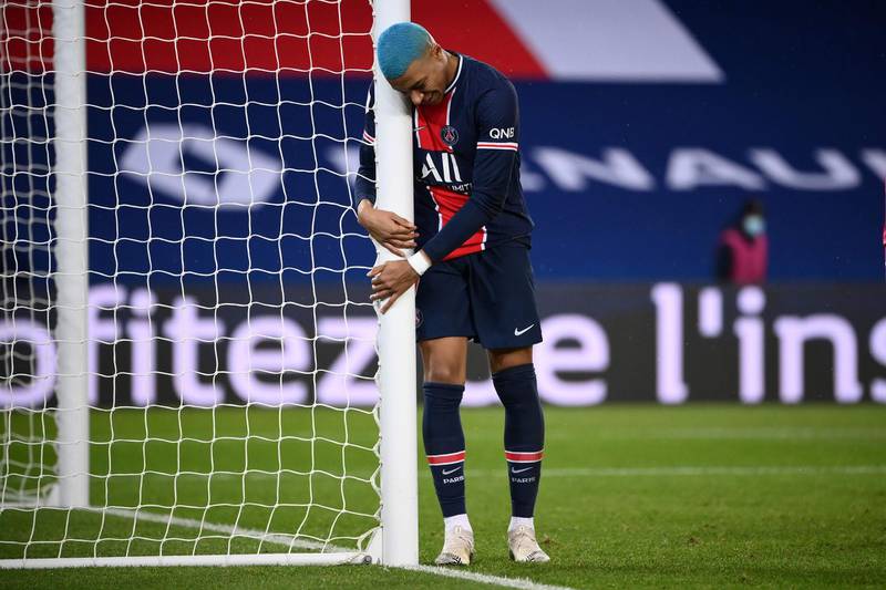 Kylian Mbappe reacts after missing an opportunity to score. AFP