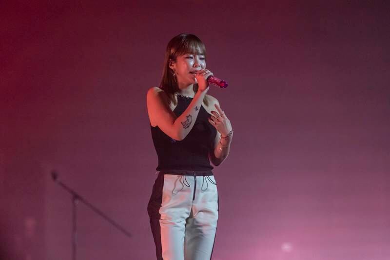 Heize performs on stage at The Agenda.