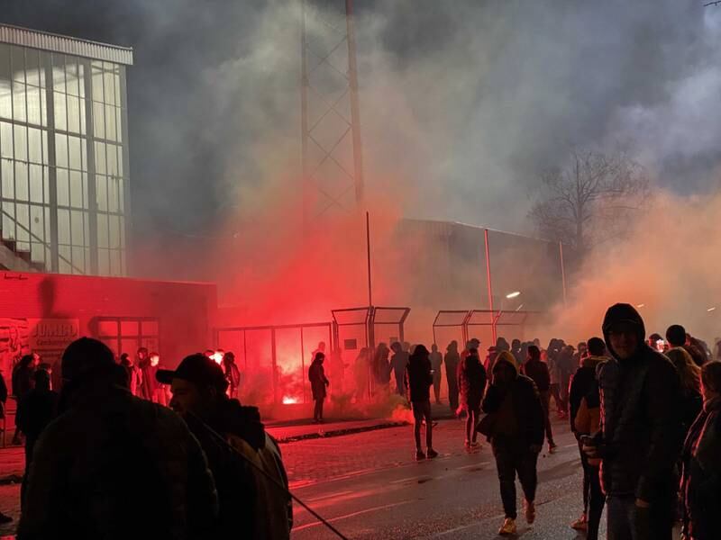 Protesters gather outside the SC Cambuur stadium  in Leeuwarden, The Netherlands, after they were not allowed to watch a match due to coronavirus restrictions. EPA