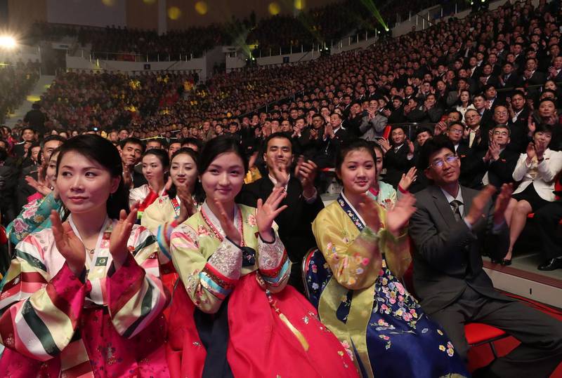 North Koreans react as they watch a joint performance by South and North Korean musicians at the 12,000-seat Ryugyong Jong Ju Yong Gymnasium in Pyongyang. AFP