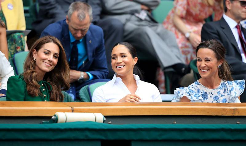 The Duchess of Cambridge and The Duchess of Sussex with Pippa Matthews on day twelve of the Wimbledon Championships at the All England Lawn Tennis and Croquet Club, Wimbledon. Photo: PA
