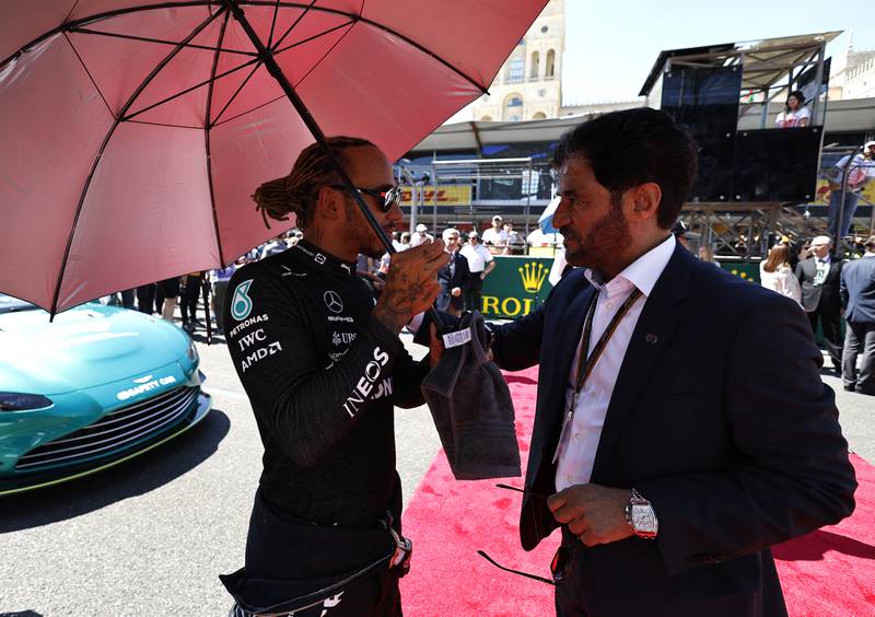 Mercedes' Lewis Hamilton with FIA president Mohammed Ben Sulayem on the grid before the Azerbaijan GP on June 12, 2022. Reuters