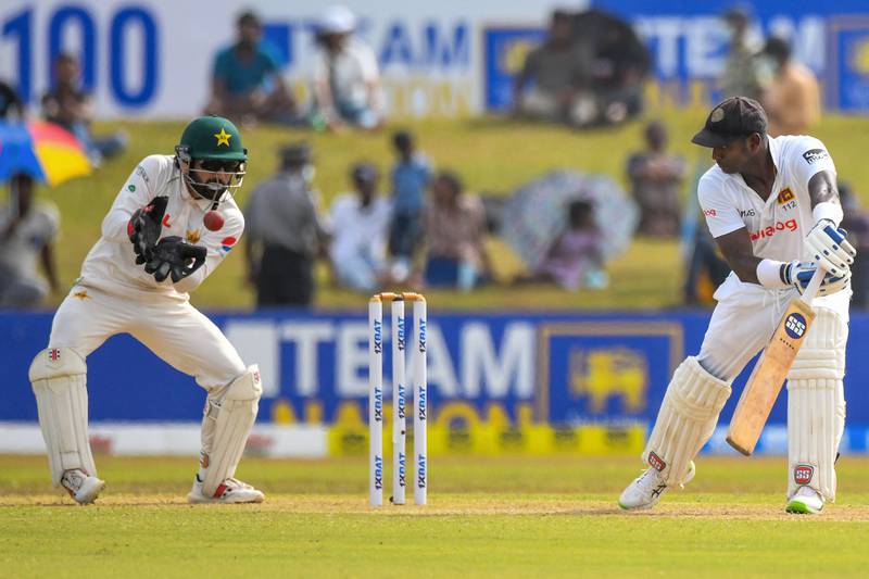 Pakistan wicketkeeper Mohammad Rizwan takes a catch to dismiss Sri Lanka's Angelo Mathews. AFP