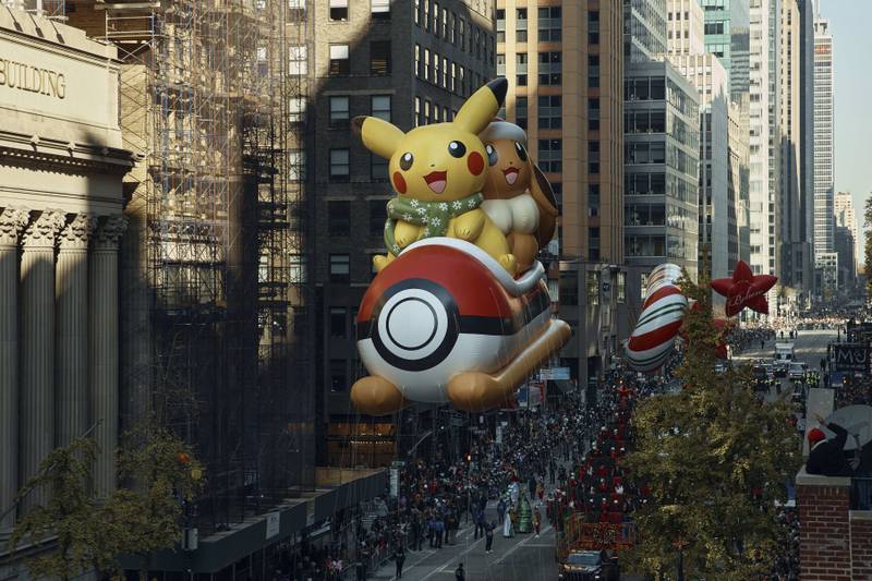 Pikachu balloon floats along Sixth Avenue. AP Photo